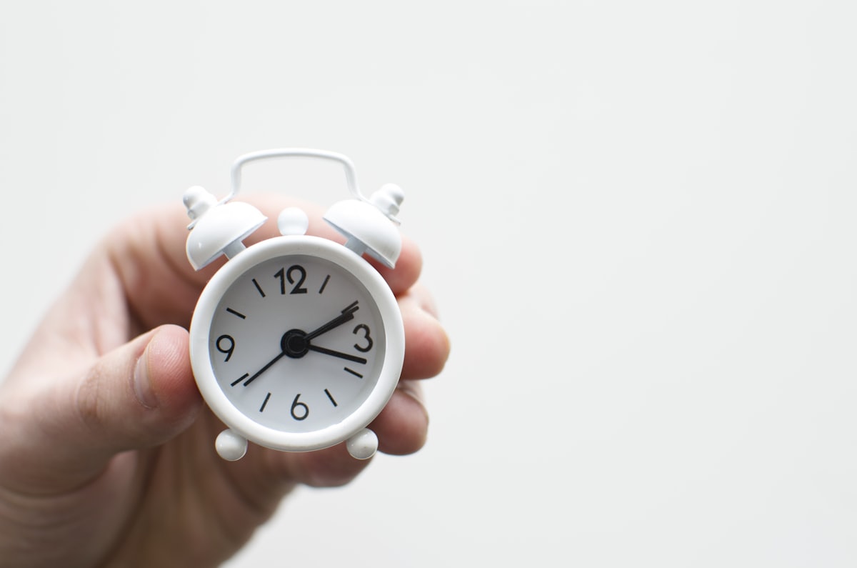 Sleep-themed photo: clock alarm — a Sleep, Finally guide to is social jet lag real