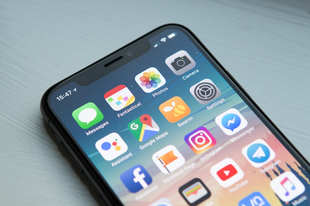 Sleep-themed photo: phone hand — a Sleep, Finally guide to notifications at night what one buzz does to sleep