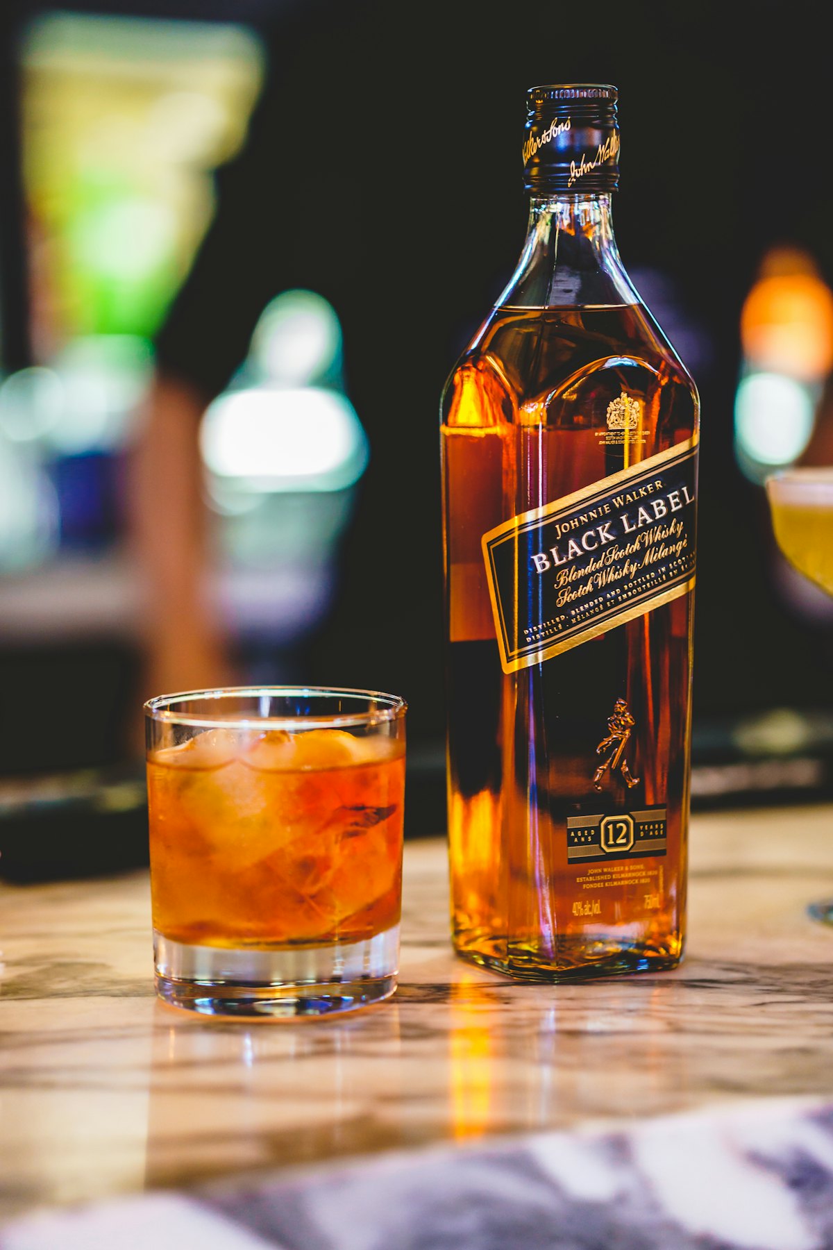 Sleep-themed photo: whiskey bottle — a Sleep, Finally guide to phone as alarm clock problem