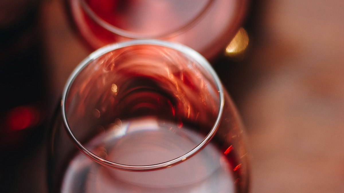 Clear drinking glass with red liquid. — a Sleep Finally guide to Two Glasses of Wine and Insomnia: The Real Deal.