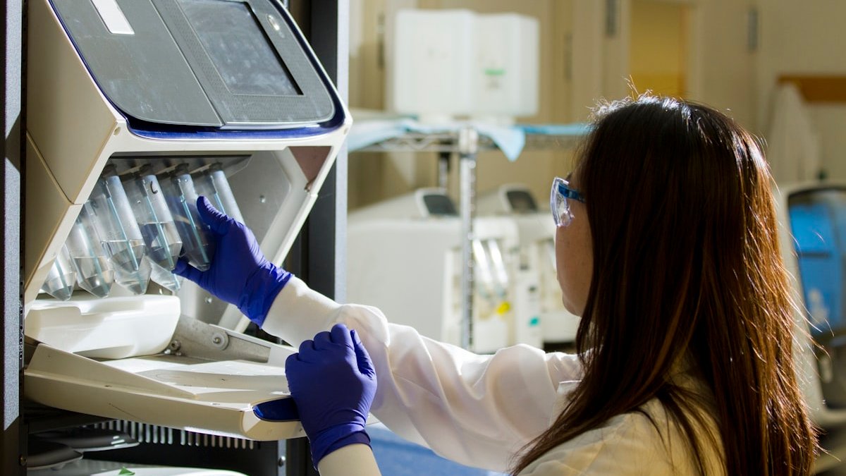 Woman holding test tubes. — a Sleep Finally guide to What Happens During an In-Lab Sleep Study.