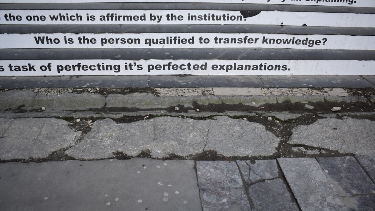 A set of stairs with a poem written on them. — a Sleep Finally guide to What Is Paradoxical Intention for Sleep?.