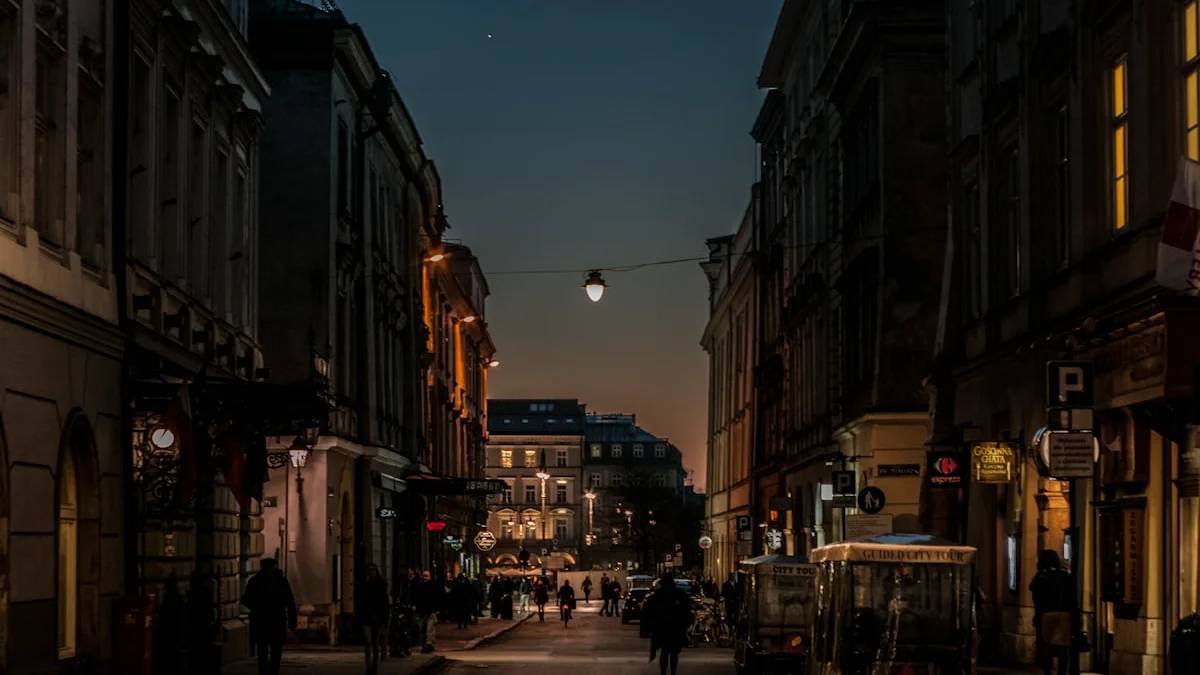 gray concrete road between buildings — a Sleep, Finally guide to Why You Can't Fall Asleep Right After Work