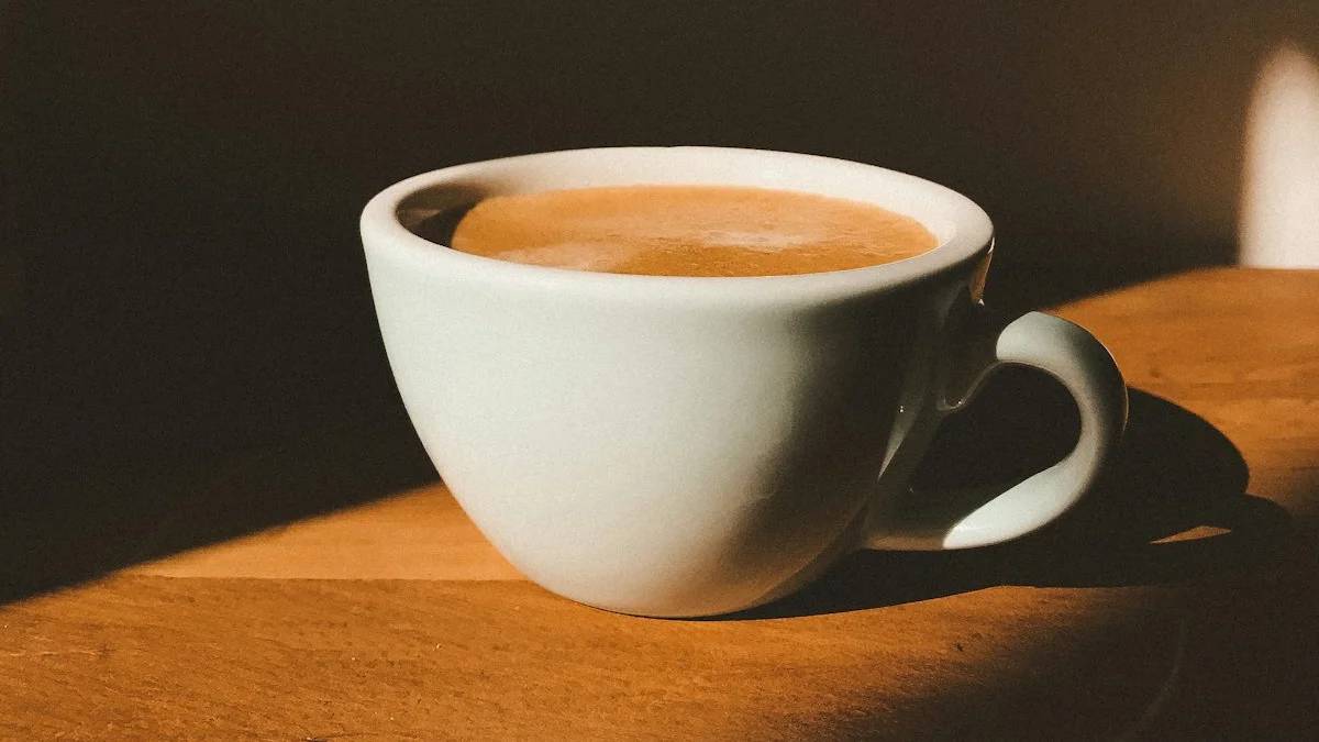 white ceramic cup on brown wooden table — a Sleep, Finally guide to Your Liver Skips the Average: Caffeine Math Is Personal